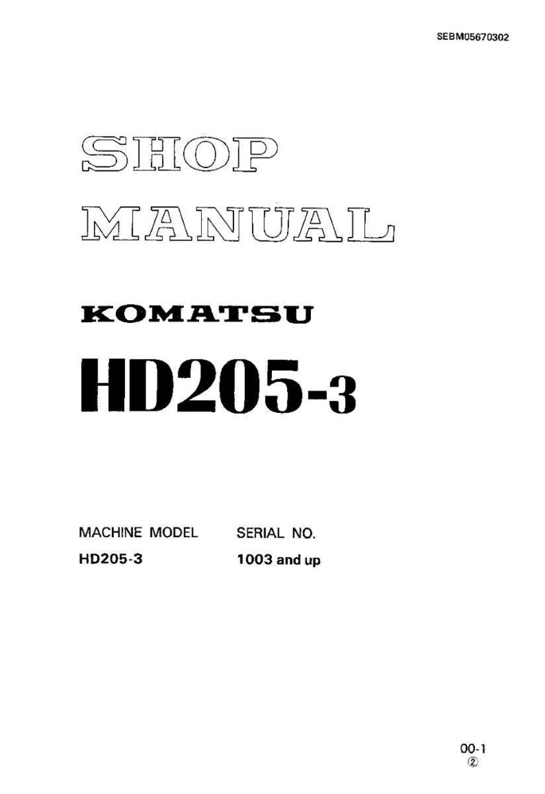 May include: A white page with the text "SHOP MANUAL" in a large font. Below, the text "KOMATSU HD205-3" is displayed in bold, black letters. The bottom of the page includes "MACHINE MODEL HD205-3" and "SERIAL NO. 1003 and up."