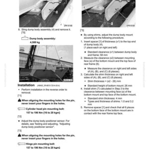 Puede incluir: Diagrama t&eacute;cnico con instrucciones para desmontar y montar una caja volquete. Incluye diagramas, medidas en mm y especificaciones de par para pernos. El texto incluye advertencias sobre la colocaci&oacute;n de los dedos.