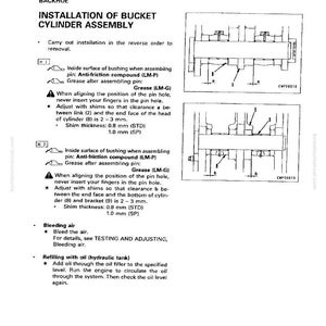 May include: Diagram of a backhoe bucket cylinder assembly installation, with detailed instructions and illustrations. Includes steps for bushing, grease application, and shim adjustments. Text includes measurements in millimeters.