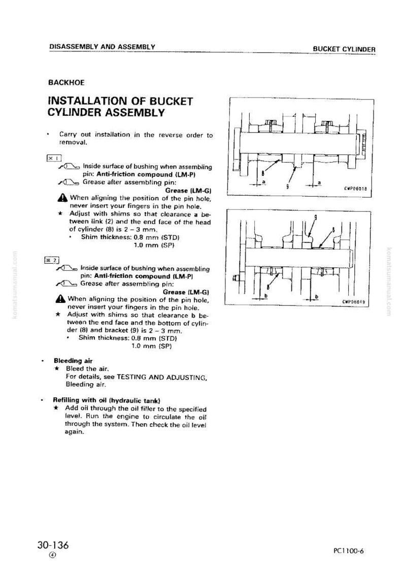 May include: Diagram of a backhoe bucket cylinder assembly installation, with detailed instructions and illustrations. Includes steps for bushing, grease application, and shim adjustments. Text includes measurements in millimeters.