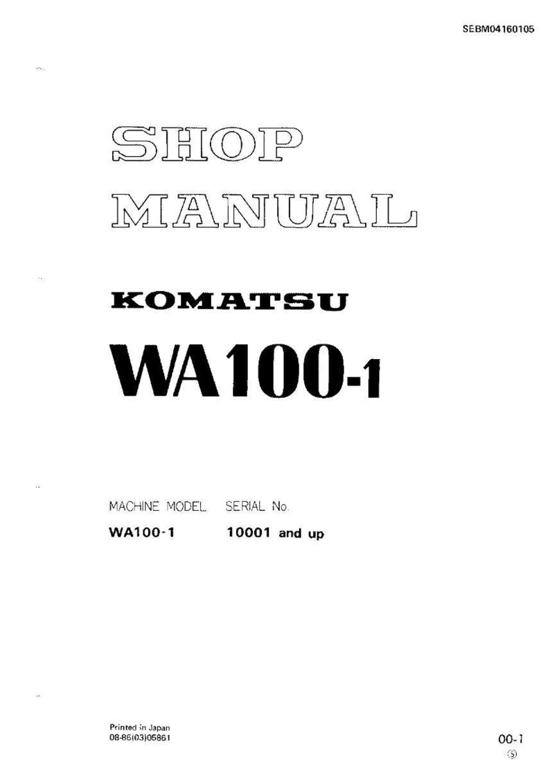 May include: A white shop manual cover with the text "SHOP MANUAL" in a stylized font. Below, the KOMATSU logo and "WA100-1" are prominently displayed. The bottom of the cover includes "WA100-1" and "10001 and up".