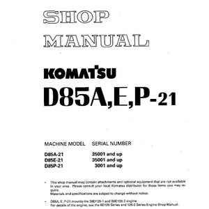 May include: A white shop manual with the title "SHOP MANUAL" in large, outlined text. Below, the text "KOMATSU D85A,E,P-21" is prominently displayed. The manual includes machine model and serial number information.