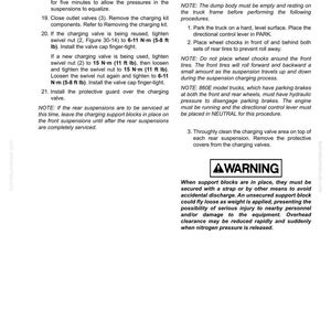 May include: A manual page detailing procedures for testing and adjusting rear suspensions. Instructions cover valve adjustments and safety precautions. The text includes a warning about support blocks and potential injury.