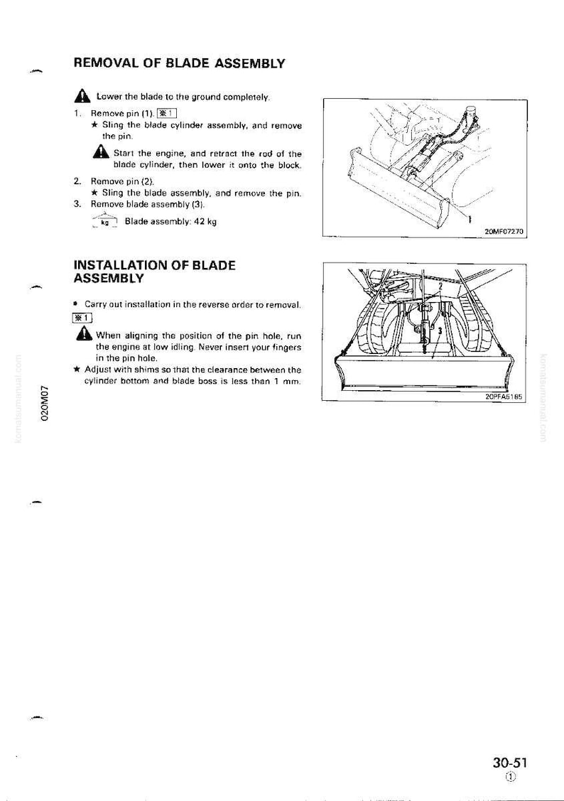 May include: A technical diagram with instructions for removing and installing a blade assembly. The text includes steps for removing pins, retracting rods, and adjusting shims. The blade assembly weighs 42 kg.