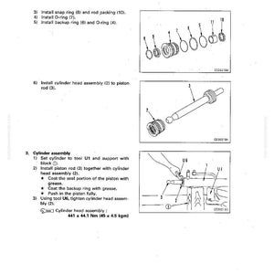 May include: Diagram illustrating the disassembly and assembly of a ripper pin-puller cylinder. The image shows various components, including snap rings, O-rings, and piston rods, with measurements in Newton metres and kilogram-metres.