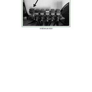May include: Image of a rate control flow control solenoid valve assembly. The assembly consists of multiple black components with attached black tubes. The text "Y210" and "N106743-UN: Y210" are visible.