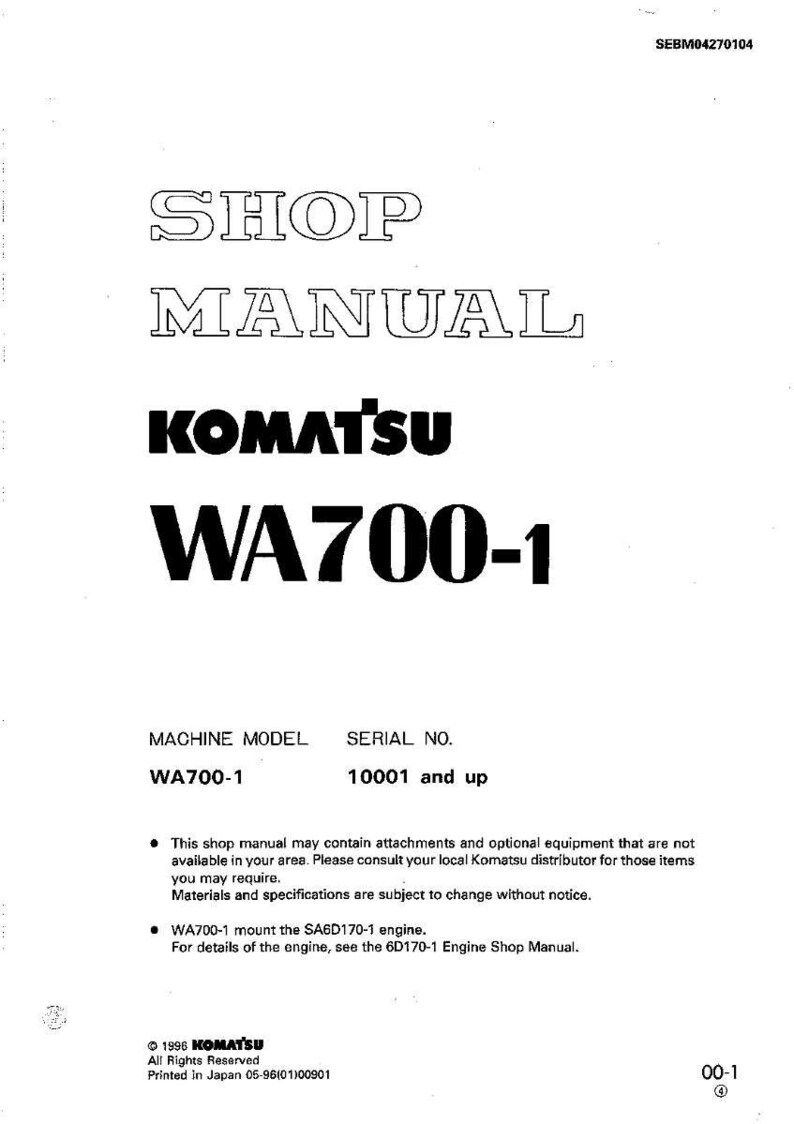 Op de afbeelding: Een wit werkplaatshandboek met de tekst "SHOP MANUAL" en "KOMATSU WA700-1" in zwarte letters. De handleiding bevat het machinemodel WA700-1 en serienummer 10001 en hoger. Het Komatsu-logo is ook zichtbaar.