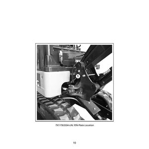 May include: Black and white image of a section of heavy machinery. The image shows a close-up of the pin plate location, with the number 1 visible. The text "TX1176333A-UN: PIN Plate Location" is also present.