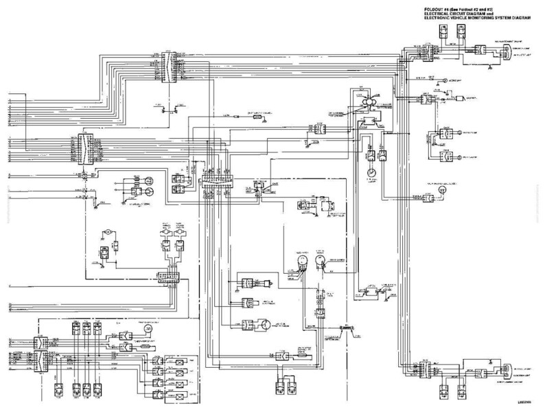 May include: A detailed black and white electrical circuit diagram for an electronic vehicle monitoring system. The diagram includes numerous lines, symbols, and text labels, providing a comprehensive visual representation of the system's components and connections.