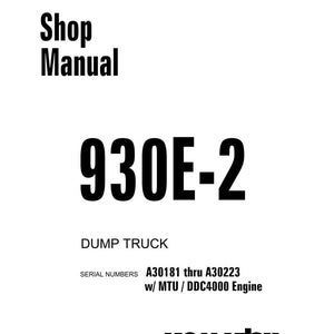May include: A white shop manual with the text "Shop Manual" in bold black letters. The manual is for a 930E-2 dump truck, with serial numbers A30181 thru A30223. The Komatsu logo is at the bottom.