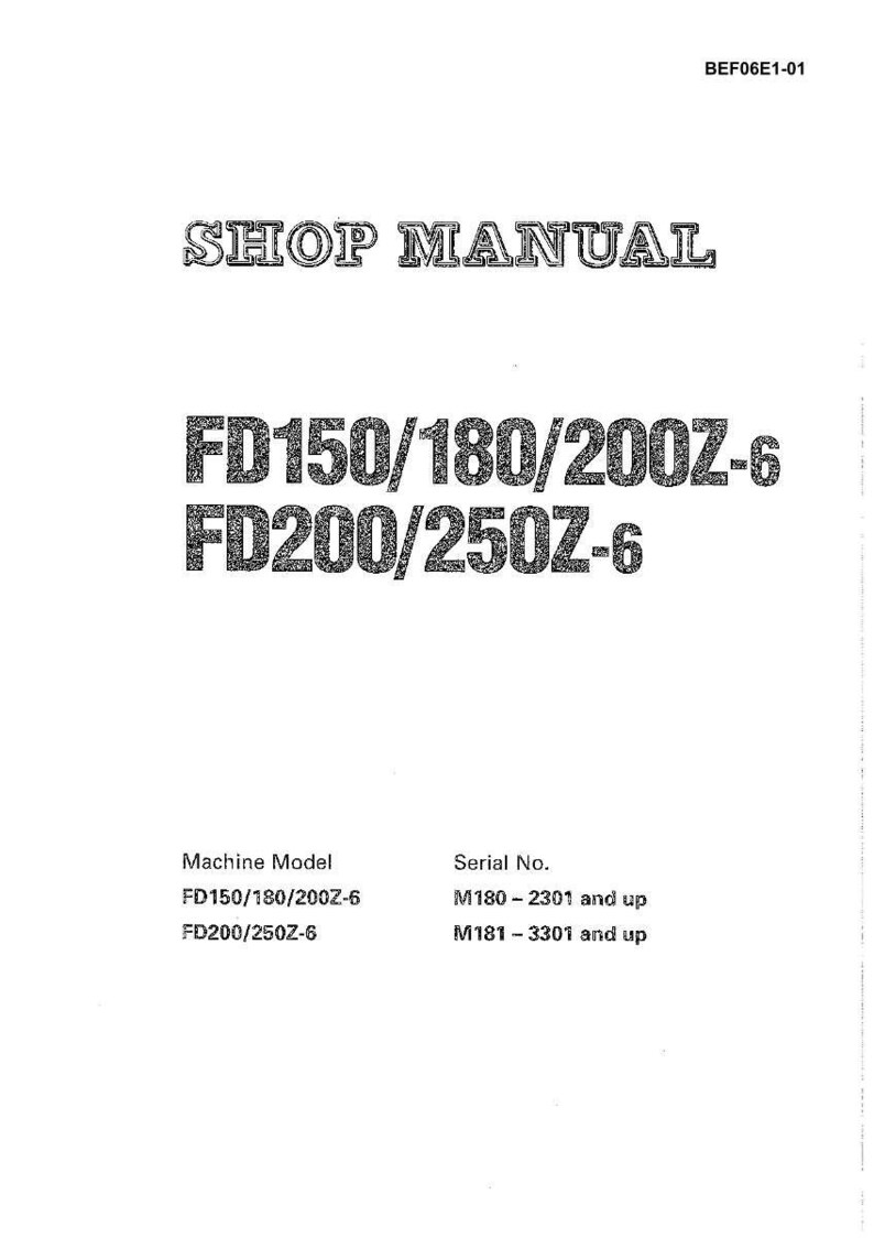 May include: A white shop manual with the title "SHOP MANUAL" in a decorative font. The manual lists machine models FD150/180/200Z-6 and FD200/250Z-6, along with serial number ranges. The document has the code BEF06E1-01.