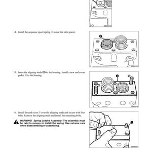 May include: Diagram of transmission disassembly and assembly instructions. Includes illustrations of installing tube spacers, sequence spool springs, aligning studs, and end covers. Text includes warnings about spring-loaded assemblies.