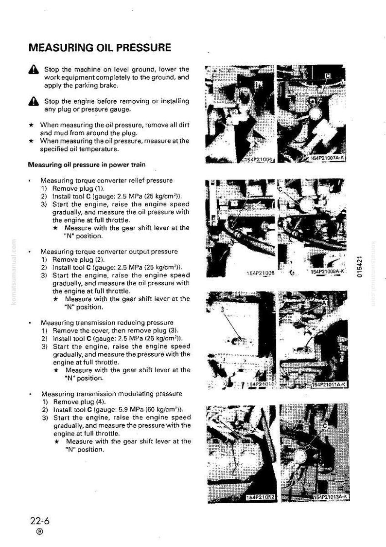 May include: A black and white technical diagram titled "MEASURING OIL PRESSURE" with instructions and diagrams for measuring oil pressure in a power train. Includes diagrams of engine components and gauge readings.