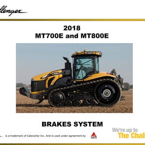 Op de afbeelding: Een gele en zwarte Challenger MT700E tractor met een zwart rupsbandsysteem. De afbeelding bevat de tekst "2018 MT700E and MT800E" en "BRAKES SYSTEM". Het Challenger-logo is linksboven zichtbaar.