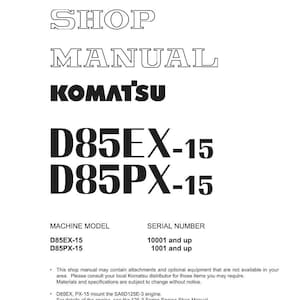 Pode incluir: Manual de oficina branco com o texto "SHOP MANUAL" e o logotipo "KOMATSU" em preto. Apresenta os modelos D85EX-15 e D85PX-15. Impresso no Jap&atilde;o, inclui especifica&ccedil;&otilde;es t&eacute;cnicas.