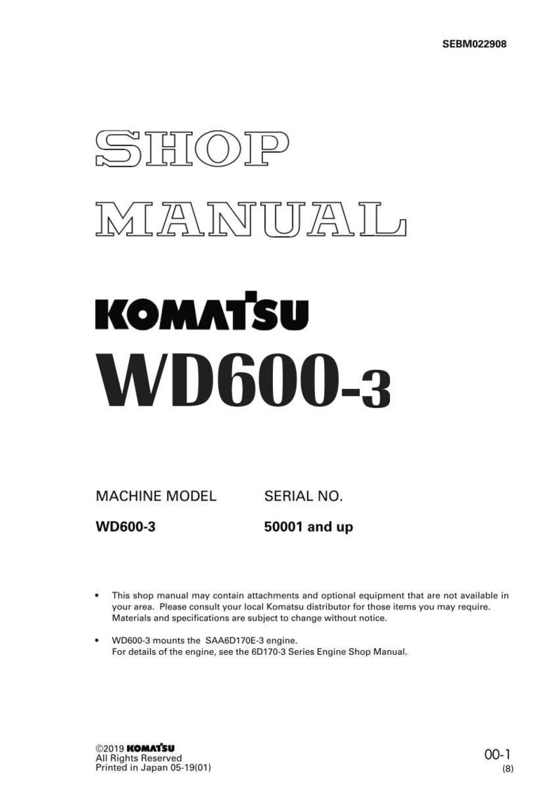 May include: A white shop manual with the text "SHOP MANUAL" in large, outlined letters. Below, the Komatsu logo and "WD600-3" are prominently displayed. The manual includes machine model and serial number information.