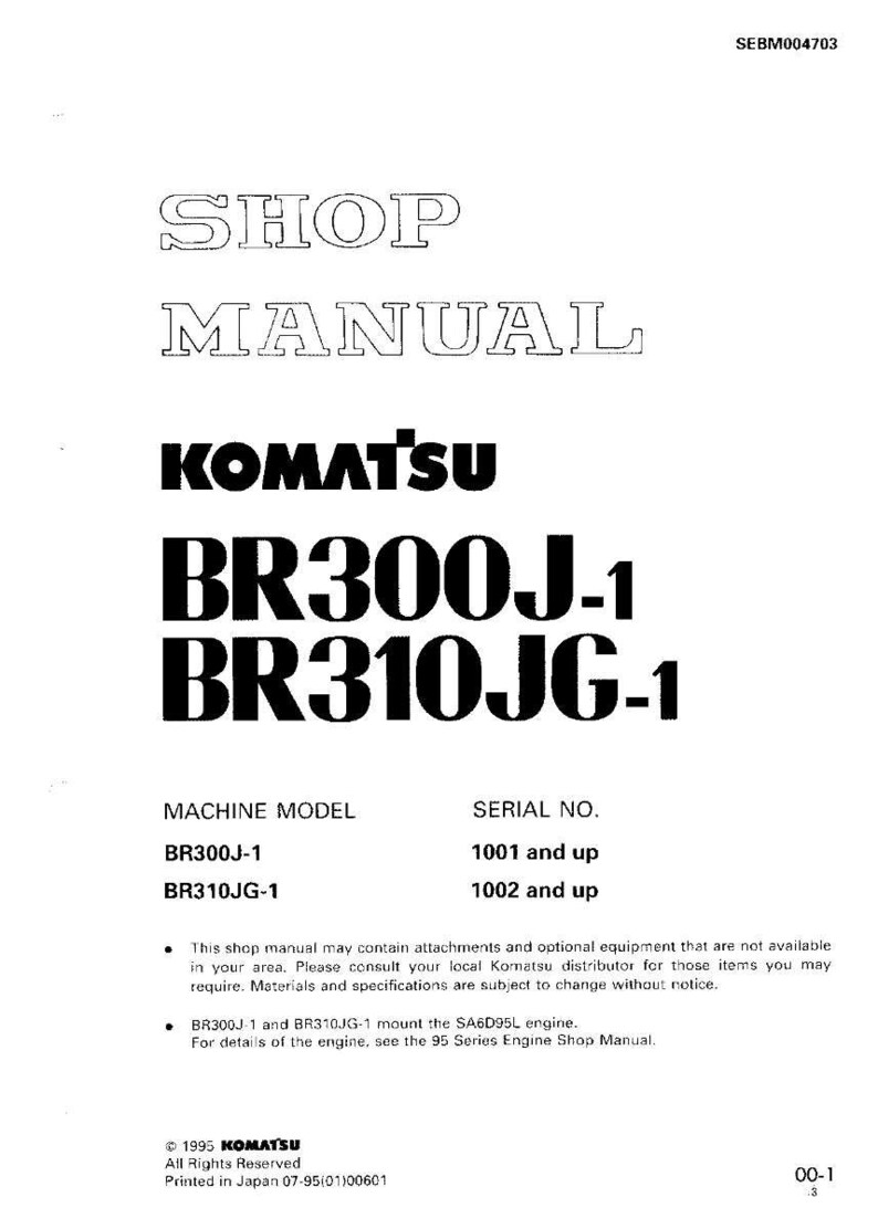May include: A white shop manual featuring the Komatsu logo and model numbers BR300J-1 and BR310JG-1. The manual includes machine model and serial number details, printed in Japan.