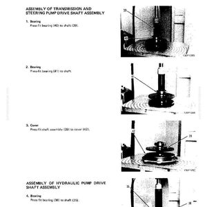 May include: Technical diagram showing the disassembly and assembly of a torque converter. The image includes detailed illustrations of the transmission and steering pump drive shaft assembly and the hydraulic pump drive shaft assembly.