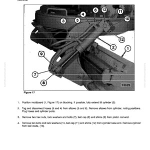 May include: A black and white diagram from a shop manual detailing the removal of moldboard tilt cylinders. The diagram includes numbered components and instructions for disassembly, with the text "SHOP MANUAL SECTION E-33.00K".