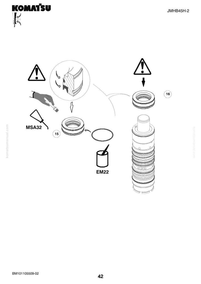 May include: Diagram of Komatsu parts with labels and symbols. Includes a hand applying a substance with MSA32, a container labeled EM22, and various mechanical components. Warning symbols are present.