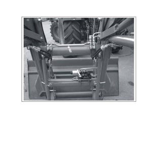 May include: A technical diagram showing the pipe layout for a front loader, with text detailing the starting specifications. The image presents the mechanical components of the loader, including pipes and structural elements, in grayscale.