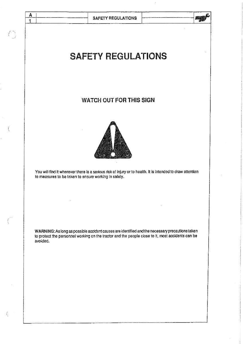May include: A white sheet of paper with the words "SAFETY REGULATIONS" at the top. Below, the text "WATCH OUT FOR THIS SIGN" is displayed above a black warning symbol. Additional text provides safety instructions.
