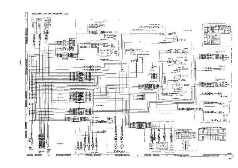 May include: A detailed black and white electric circuit diagram labeled "ELECTRIC CIRCUIT DIAGRAM (2/2)". The diagram features numerous lines, symbols, and text, illustrating the complex wiring of an electrical system. The image is a technical illustration.