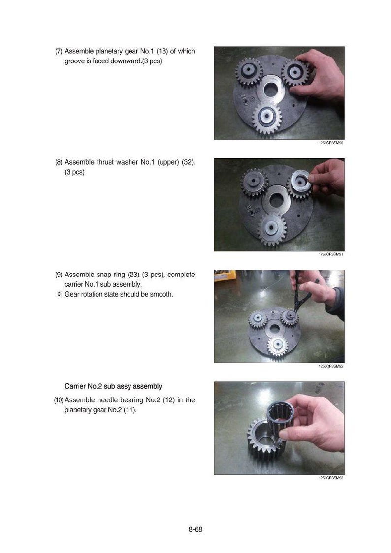 May include: Assembly instructions for mechanical components. The image shows the assembly of planetary gears, thrust washers, and snap rings. The text includes step-by-step instructions and part numbers for each component. The image is a technical diagram.