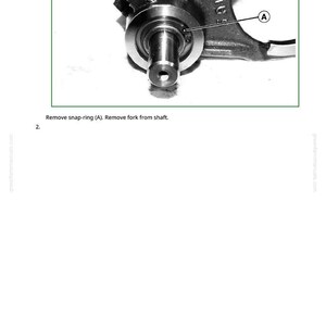 Op de afbeelding: Diagram van een schakelassemblage met focus op de borgring (A) en de vork. De tekst "Schakelassemblage demonteren" staat bovenaan, met instructies eronder. De afbeelding staat in een groen omkaderd vak.