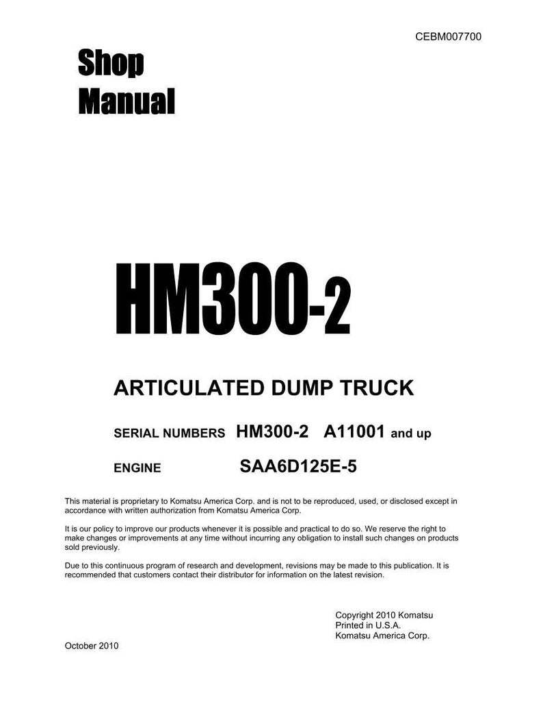 May include: A white shop manual titled "HM300-2" for an articulated dump truck. The cover includes the text "Shop Manual" and "ARTICULATED DUMP TRUCK". The manual is from Komatsu America Corp.