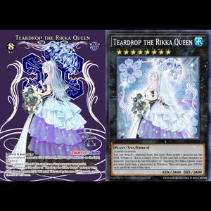 May include: Two trading cards featuring the character "Teardrop the Rikka Queen." The cards have a purple and white color scheme, with an illustration of a woman in a white and blue dress. The cards include text describing the card's abilities and stats.