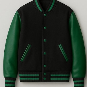 May include: Black varsity jacket with green leather sleeves. The jacket features green and black striped details on the collar, cuffs, and hem. It has a button-up front and two front pockets with green trim.