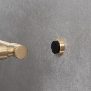 thumbnail image 2 of Excel Antique Brass Projecting Door Stop On Rose | 63mm, Zinc, DH003363ANB 2 of 2