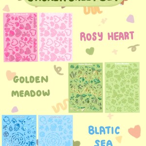 May include: A sticker sheet set with various designs, including hearts, floral, and sea motifs. The set includes sheets labelled "Rosy Heart", "Golden Meadow", and "Blatic Sea". The stickers are in pink, green, and blue hues.