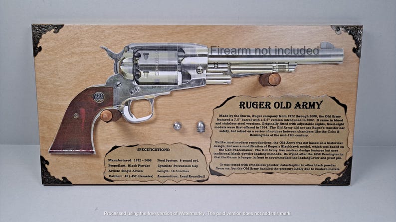 May include: A detailed display featuring a Ruger Old Army revolver, mounted on a wooden plaque. The firearm is silver and brown, with text indicating it's a replica. The plaque includes specifications and historical information. The length is 14.5 inches.