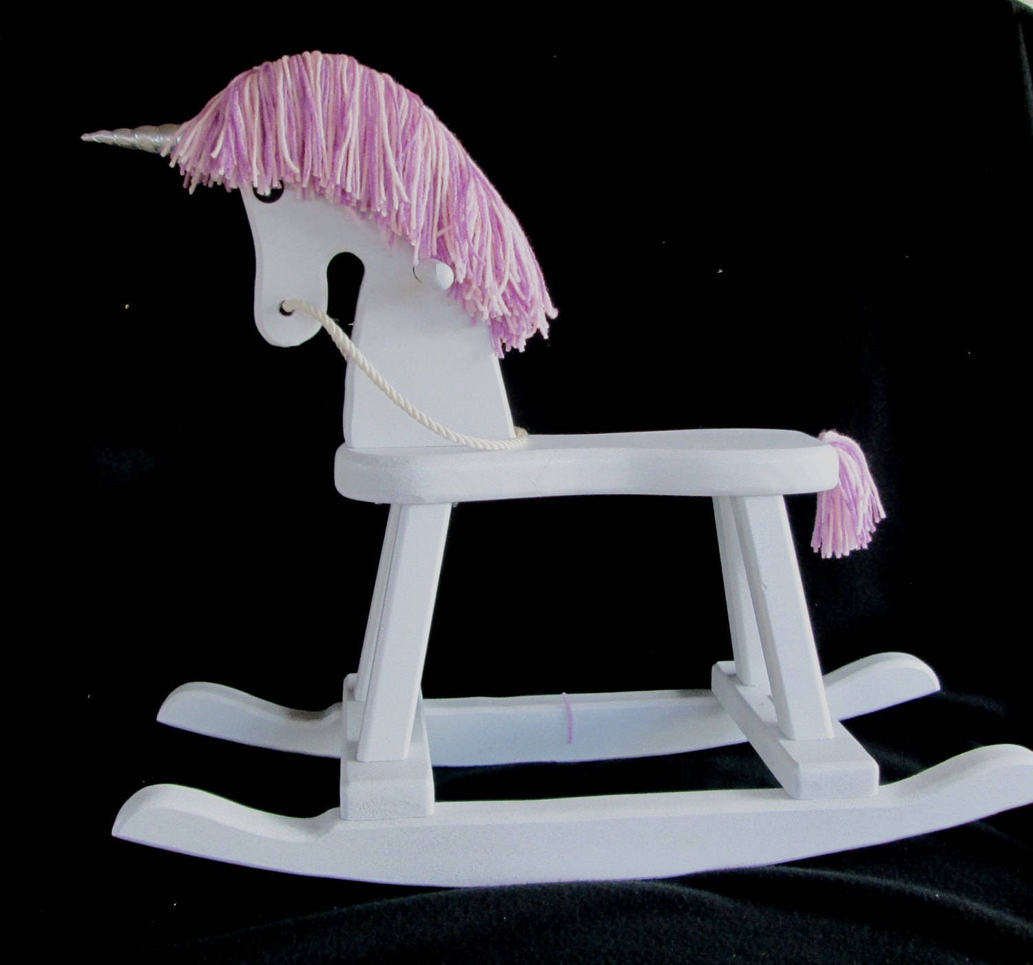 wooden rocking unicorn