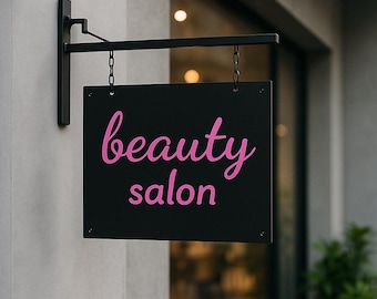 Peut inclure: Une enseigne rectangulaire noire avec les mots "beauty salon" en lettres roses. L'enseigne est suspendue par des chaînes à un support en métal noir fixé à un mur. L'arrière-plan montre une vitrine.