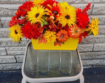 Fall Cemetery Saddle with Yellow Planter and Gorgeous Fall Flowers