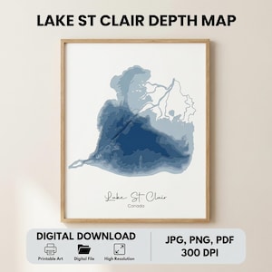 May include: A framed print of a Lake St. Clair depth map. The map uses shades of blue to show the lake's contours. The text "LAKE ST CLAIR DEPTH MAP" is at the top. Below the map is the text "Lake St. Clair Canada". The bottom of the image has "DIGITAL DOWNLOAD" and "JPG, PNG, PDF 300 DPI".