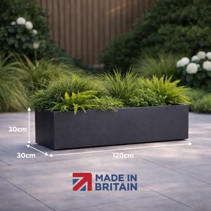 May include: A dark grey rectangular planter box, 30cm high, 30cm wide, and 120cm long, filled with green plants. The image features the text "MADE IN BRITAIN".