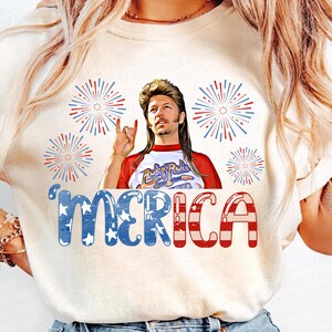 May include: White t-shirt with a red, white and blue American flag design. The shirt features a cartoon image of a man with a mullet and the text "'MERICA".