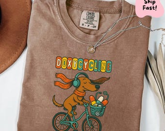 Doxycycline Pharmacy Pun Sweatshirt, Dachshund on Bicycle, Pharmacists and Technicians Gift, Veterinary, Pharmacist GiftsPharmacists Shirt