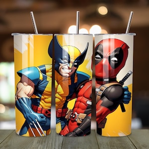 May include: Two stainless steel tumblers with a yellow background and images of Wolverine and Deadpool. Wolverine is on the left and Deadpool is on the right. Wolverine is wearing his yellow and blue costume and Deadpool is wearing his red and black costume.