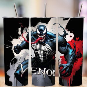May include: A set of three stainless steel tumblers featuring a Venom graphic. The design includes a black and blue Venom character with a long red tongue, white teeth, and the word "VENOM" in white. Each tumbler has a silver straw.