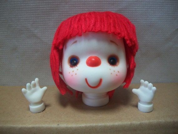 red yarn hair doll