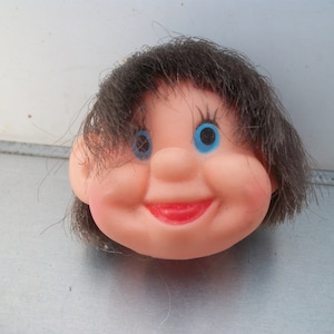 Unusual Tiny Plastic Rubber Brunette (Elf?) Head  **