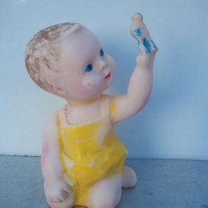 Vintage Rubber Sitting Baby With Bluebird Squeaker Toy - West Germany