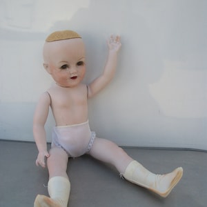 Unmarked 15 Inch Porcelain Strung Girl Doll  **