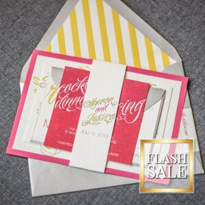 May include: Pink and white wedding invitation with a yellow and white striped envelope. The invitation features the text "Cocktail Dinner" and "Aaron and Jessica" in gold lettering. The date is July 6, 2013.