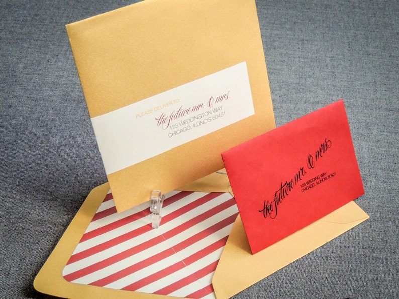 May include: Two envelopes with red and white striped paper inside. The envelopes are addressed to "the future mr. & mrs." with a street address and city, state, and zip code.